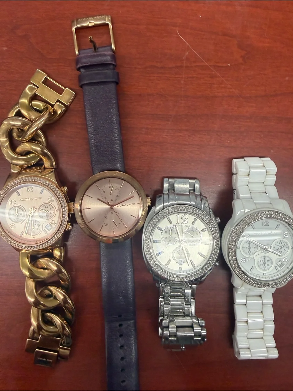 Michael Kors Women's 4 Piece Watch Set. Gold, Silver, White & Rose Gold